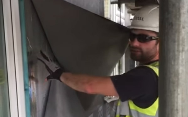 Fitting of the Britmet Tileform breather membrane over counter battens